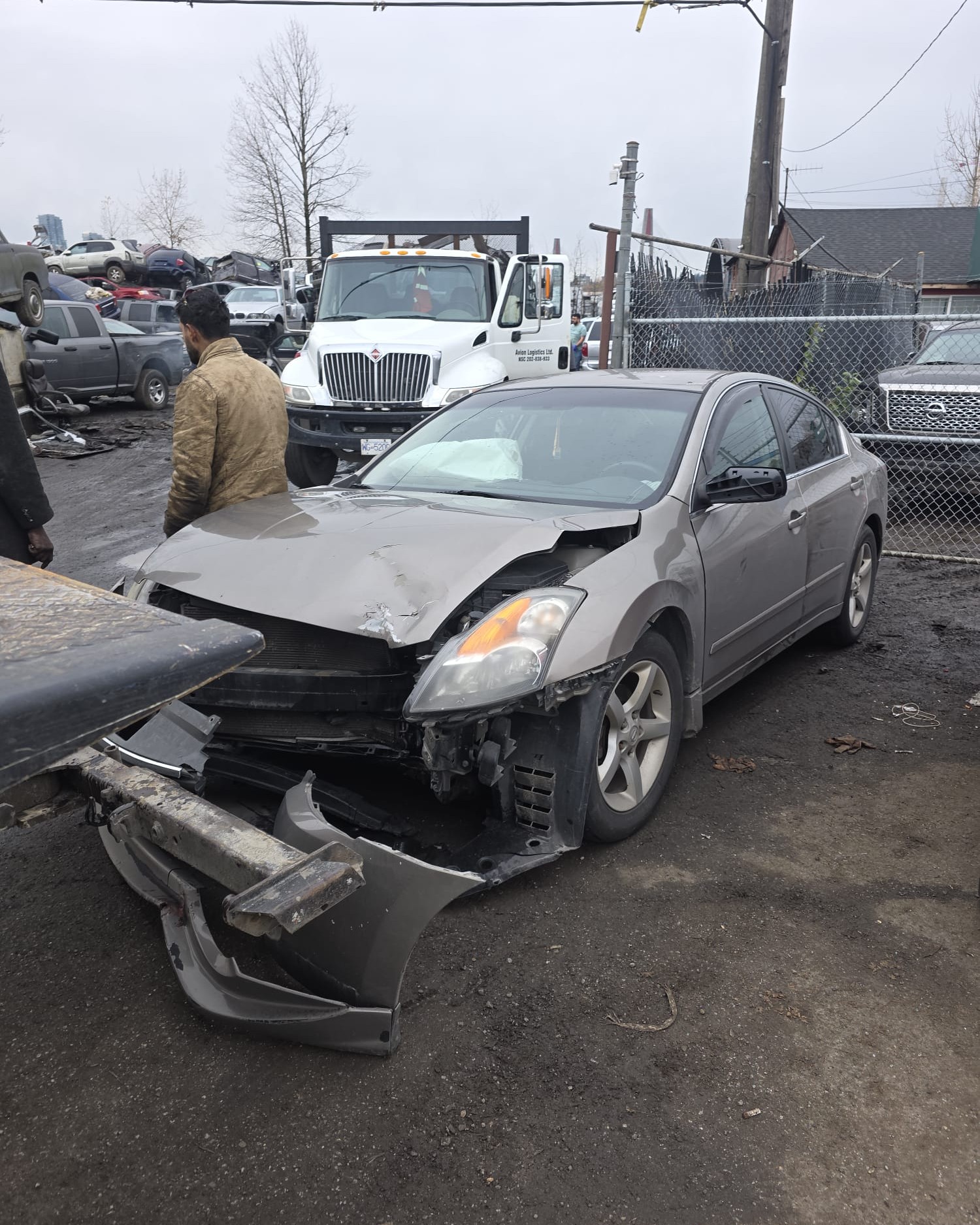 Scrap vehicle pickup and towing service